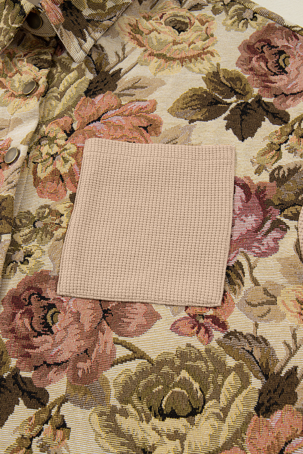 Sophisticated khaki floral patchwork waffle knit jacket with button-down front and pockets. A boho casual outerwear piece perfect for layering.