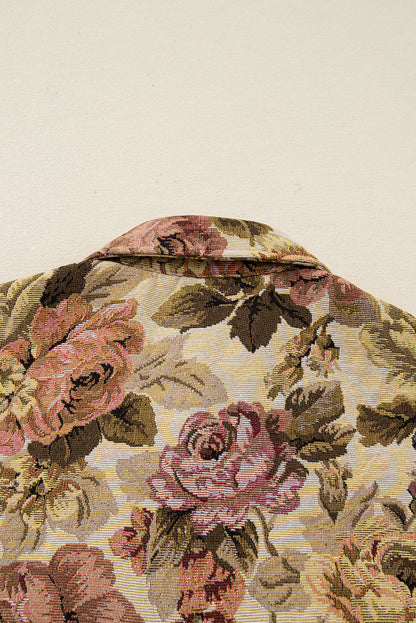 Sophisticated khaki floral patchwork waffle knit jacket with button-down front and pockets. A boho casual outerwear piece perfect for layering.