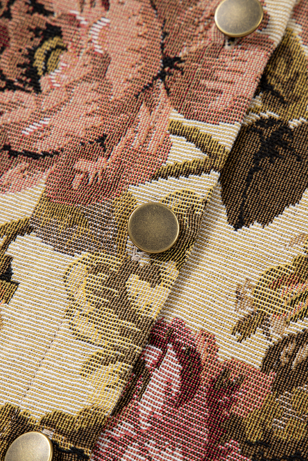 Sophisticated khaki floral patchwork waffle knit jacket with button-down front and pockets. A boho casual outerwear piece perfect for layering.