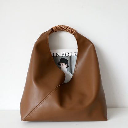Spliced woven shoulder bag