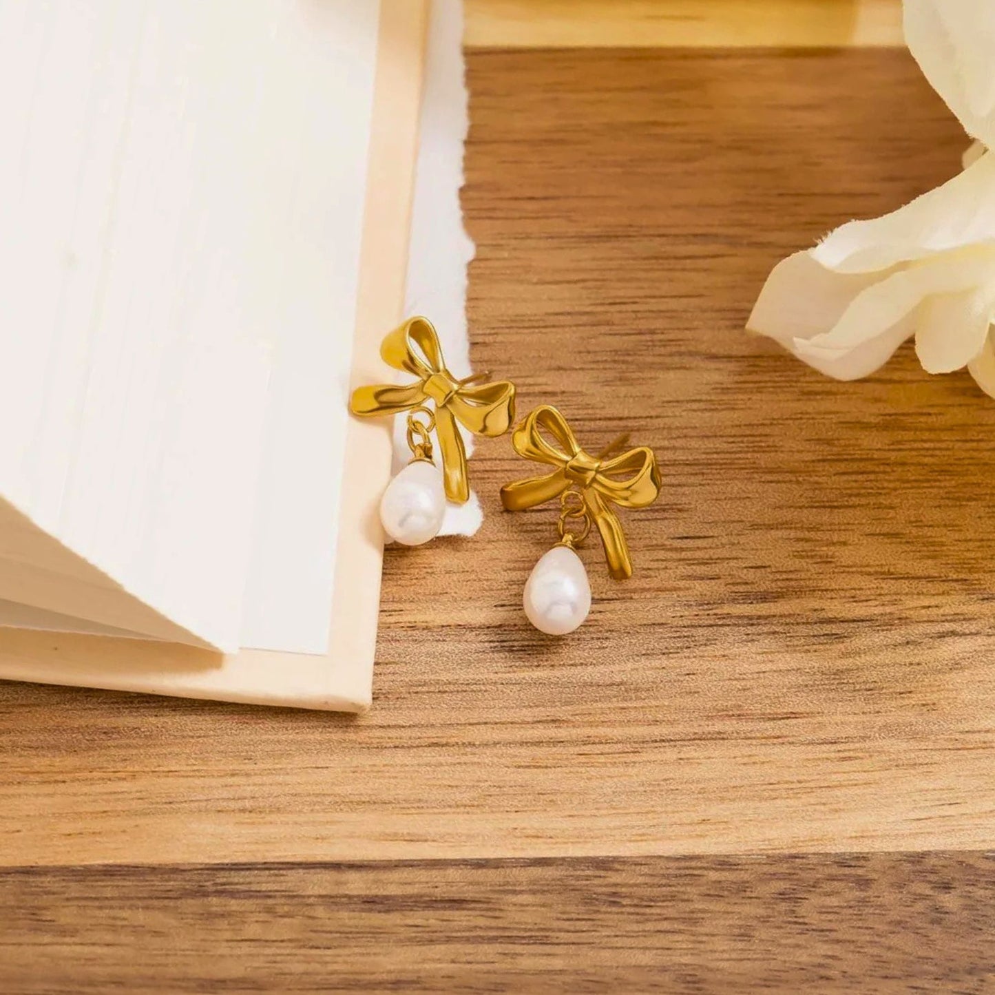 Made in the USA | 18K Gold PVD Freshwater Pearl Bow Earrings | Hypoallergenic 316L Surgical Steel