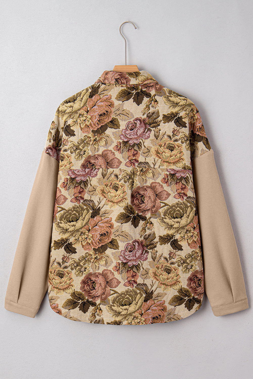 Sophisticated khaki floral patchwork waffle knit jacket with button-down front and pockets. A boho casual outerwear piece perfect for layering.
