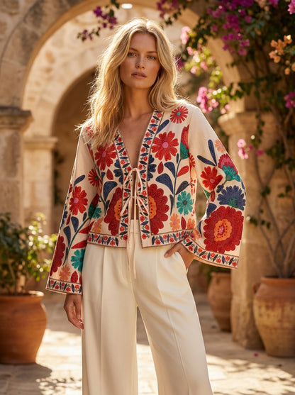 Artisan-inspired elegance meets bold floral expression.